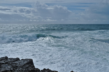 Sea, Waves and Rocks in Consolacao Beach. Peniche, Portugal