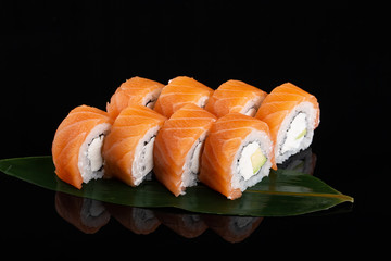 Philadelphia roll sushi with salmon, prawn, avocado, cream cheese. Sushi menu. Japanese food.