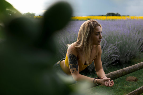 Pensive and lonely woman in a Lavender field
