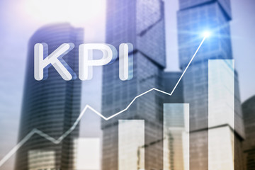 KPI - Key Performance Indicator. Business and technology concept. Multiple exposure, mixed media. Financial concept on blurred background