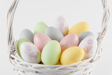 Happy Easter. Congratulatory easter background. Easter eggs and flowers