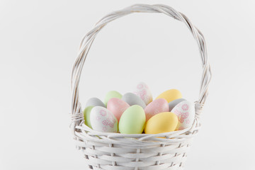 Happy Easter. Congratulatory easter background. Easter eggs and flowers