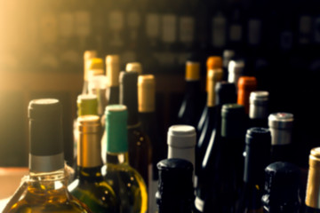 Neck of wine bottles in a liquor store in Europe