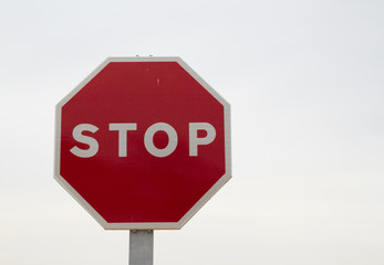 Red stop sign, isolated Traffic regulation warning sign Octagon, octagonal frame white, metal post...