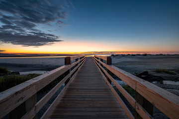 Fototapeta na wymiar Sunrise, Walkway at Goulds Inlet, East Beach, St Simons Island, GA 