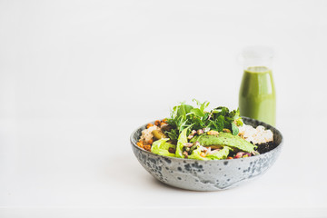 Healthy dinner or lunch. Vegan superbowl or Buddha bowl with homemade hummus, vegetable, fresh...