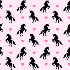vector seamless pattern with black silhoette hand drawn flat unicorn horses and hearts on pink background