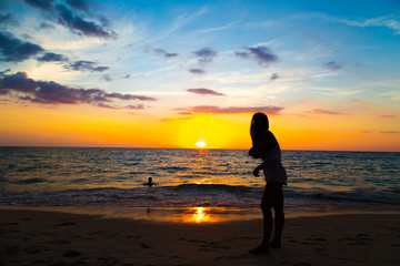 Healthy sport women doing yoga with meditaion on beach