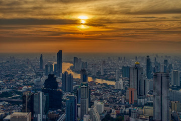 Sunset over Bangkok at the top of  King Power MahaNakhon Tower