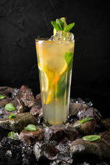 Lemonade from lemon. Summer soft drink based on citruses, berries, sugar syrup, mint and ice. Cocktail card for a bar or restaurant.