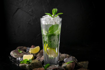 Lemonade from lime. Summer soft drink based on citruses, berries, sugar syrup, mint and ice. Cocktail card for a bar or restaurant.