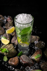 Lemonade from lime. Summer soft drink based on citruses, berries, sugar syrup, mint and ice. Cocktail card for a bar or restaurant.