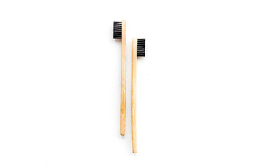 bamboo dental cleaning brush for zero waste lifestyle concept on white background top view mock up