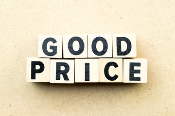 Letter block in word good price on wood background