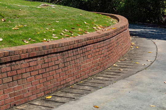 Residential Brick Retaining Wall, Curved Along Driveway, Horizontal Aspect