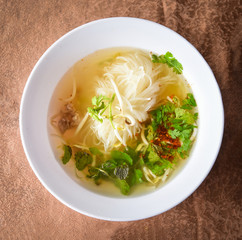 Noodle soup bowl Thai Laos Vietnam and Chinese with pork meat and vegetables asian style food
