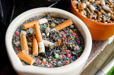 ashtray ceramic with cigarette stub