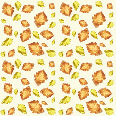 Pattern of shiny orange and yellow leaves of different sizes on a beige background.  Autumn mood.