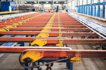 Fototapeta premium Mechanical equipment and finished products in workshop of aluminium alloy products factory