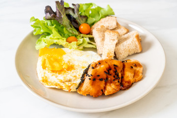 salmon teriyaki steak with fried egg and salad