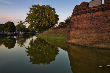 City wall from Chiang Mai with reflection in to the river 