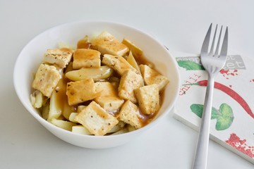 Tasty fried tofu on the white table.