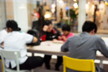 blurred photo People sitting to relax In the mall For the holidays