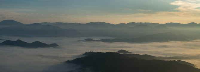 Fog, mountains, sunlight, beautiful mountain tops of the point of view. scenic beauty in the morning. Doi Lorgwador, Mae Moei, Tak in Thailand