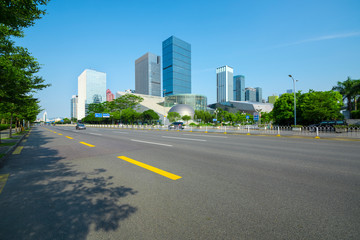Shenzhen highway transportation and the high-rise building under the blue sky.