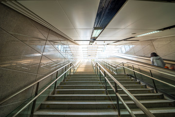 Subway station entrances and exits of the stairs and the elevator.