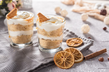 Layered mascarpone dessert with crushed vanilla biscuits and carame