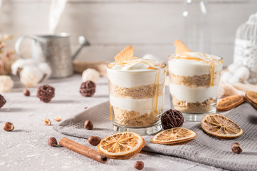 Layered mascarpone dessert with crushed vanilla biscuits and carame