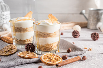 Layered mascarpone dessert with crushed vanilla biscuits and carame
