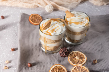 Layered mascarpone dessert with crushed vanilla biscuits and carame