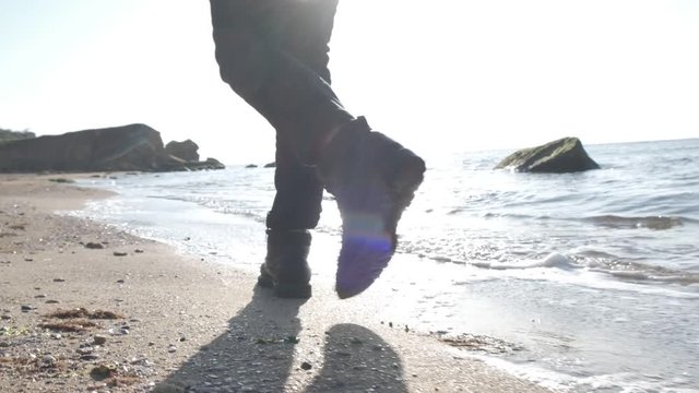 walking by the sea at sunrise