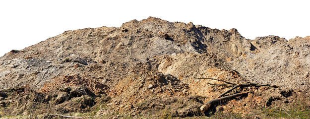 A large long  hill of construction sand, clay and soil  with traces of tractor wheels