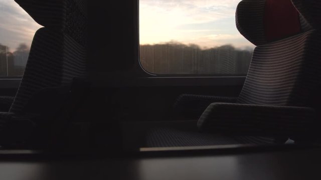 A beautiful shot of a sunrise aboard a bullet train en route to Paris.