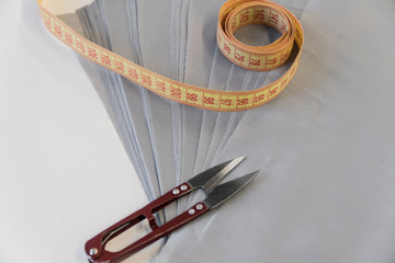 Obraz premium fabric scissors cm. sewing shop. tailoring