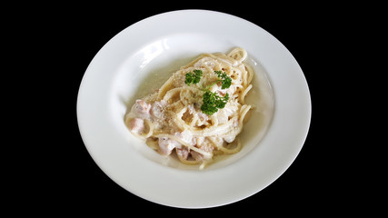 close-up spaghetti carbonara bacon with clipping part isolated on black background