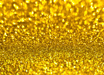 Textured golden background with brilliance