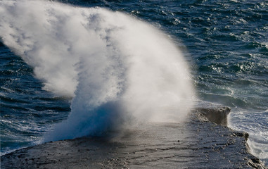 The coastline on the Peninsula Valdes. Waves crashing against the rocks. Argentina. South America