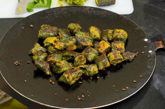 Alu Vadi or Colocasia leaves steamed and then fried. Maharashtrian and Gujrati snack.