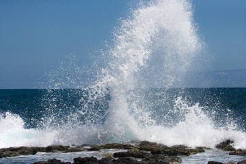 Waves crashing against the rocks. Galapagos Islands. Landscape. Ecuador. Pacific Ocean. South...