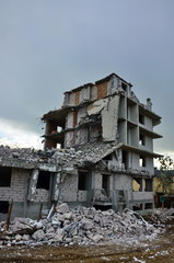 Ruins of the destroyed building and dwelling