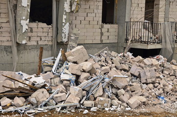 Ruins of the destroyed building and dwelling