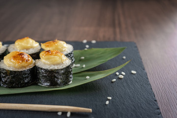 Baked rolls on bamboo stalks