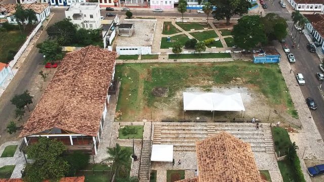 Drone footage of the downtown area of the city of Pirenopolis, Brazil, including aerial footage of a local church.