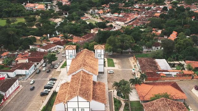 Drone footage of the downtown area of the city of Pirenopolis, Brazil, including aerial footage of a local church.