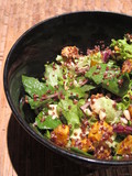 Red Quinoa Salad in Black Bowl