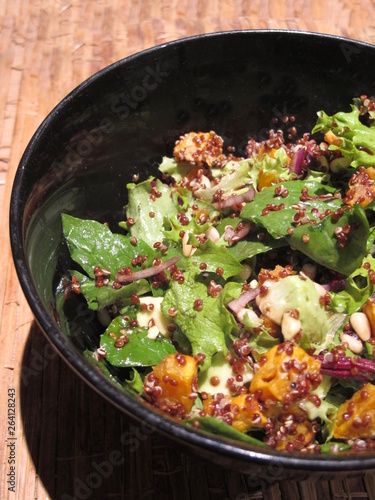 Red Quinoa Salad in Black Bowl